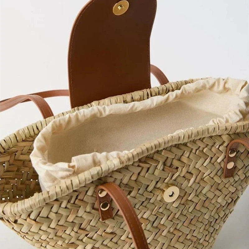 Aisea skuldertaske i flettet rattan