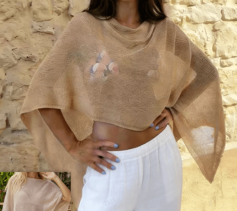 Asymmetrisk gennemsigtig ponchobluse