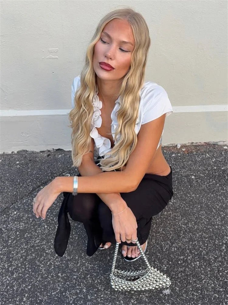 Bianca cropped tanktop med flæser og snøredetalje