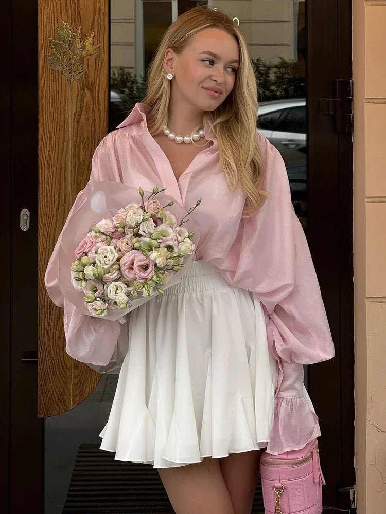 Brielle gennemsigtig bluse med knapper