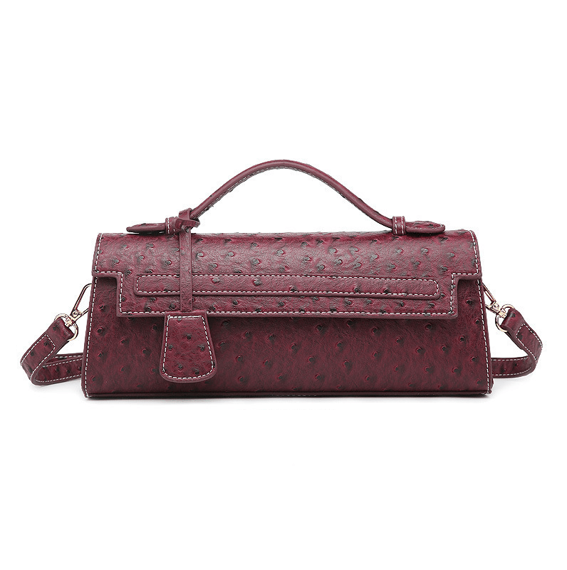 Jasmin-clutch med præget mønster