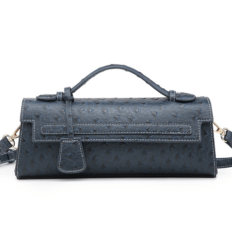 Jasmin-clutch med præget mønster