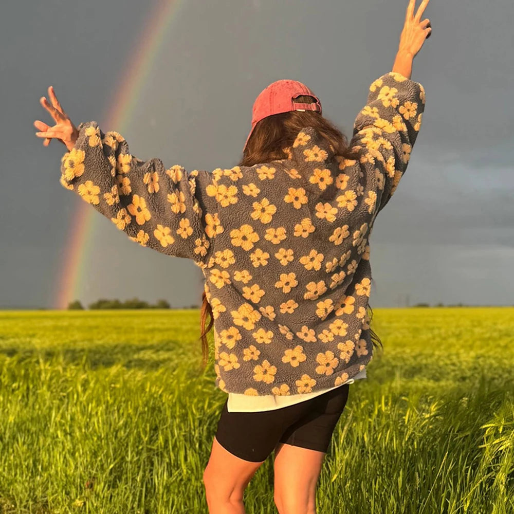 Oversized striksweater med lynlås