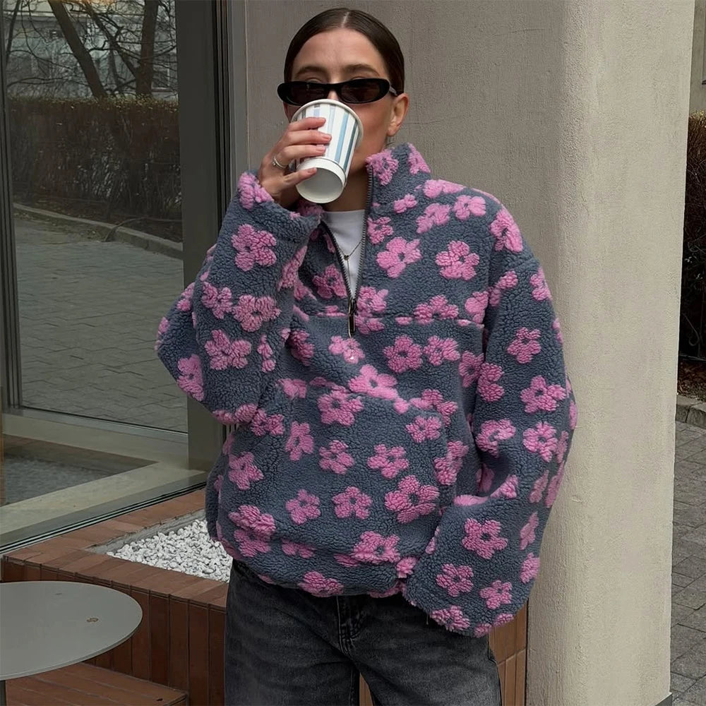 Oversized striksweater med lynlås
