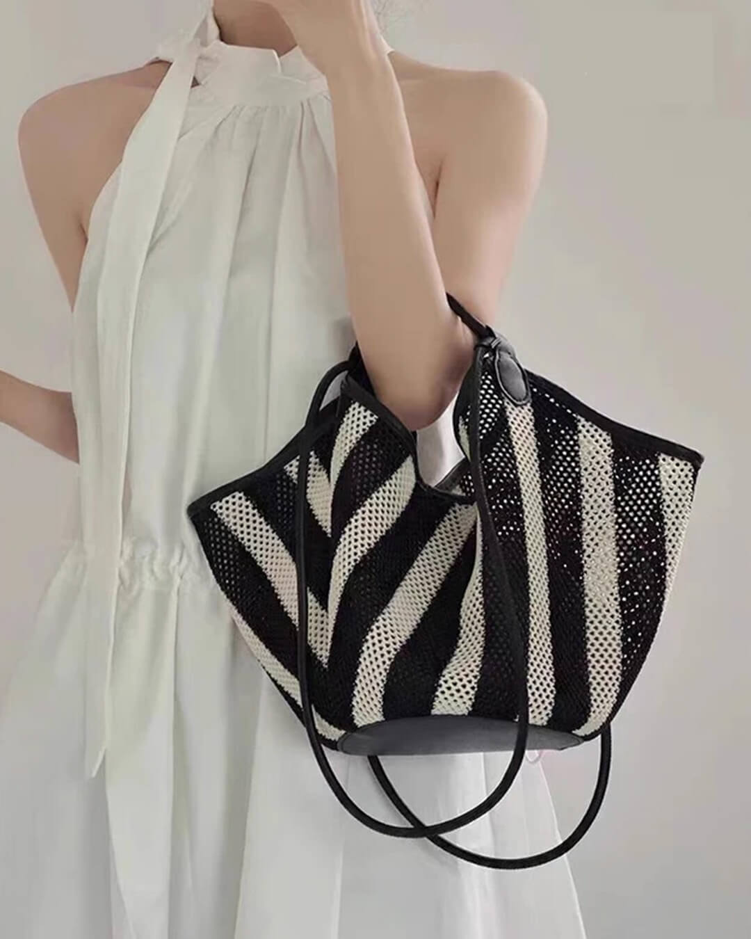 Liam flettet crossbody-taske