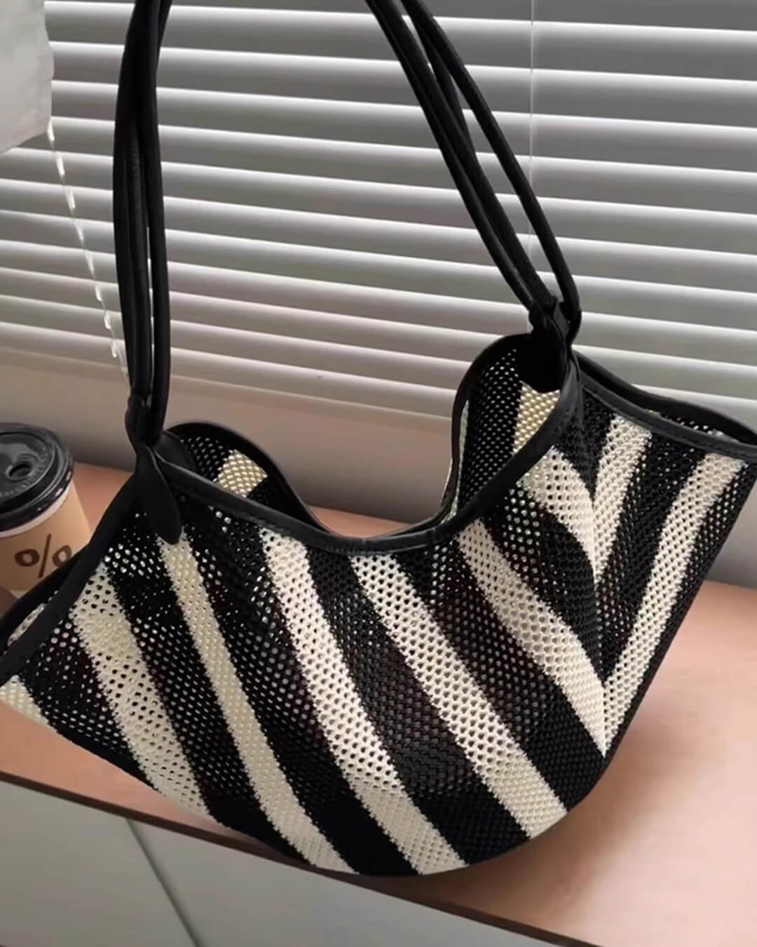 Liam flettet crossbody-taske