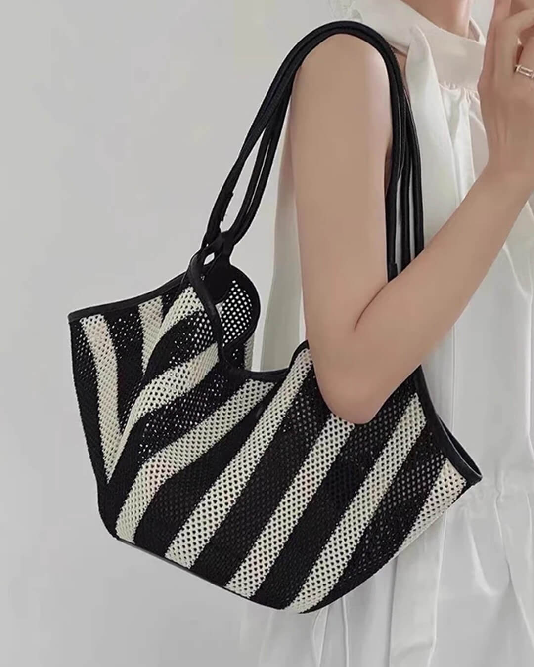 Liam flettet crossbody-taske