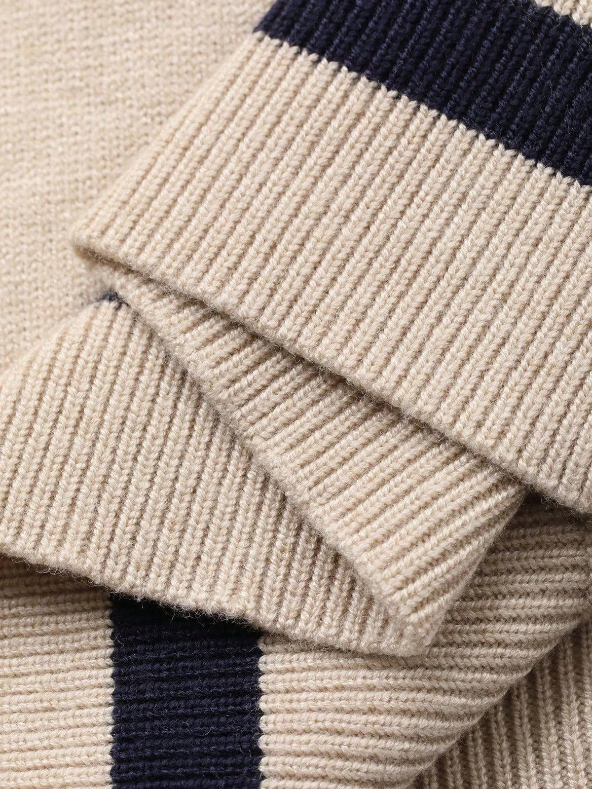 Paris strikpolotop med colourblock