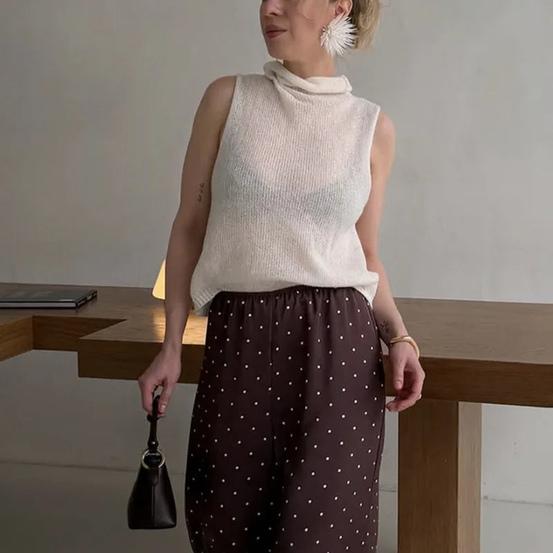 Transparent oversized striktrøje med udskæringer