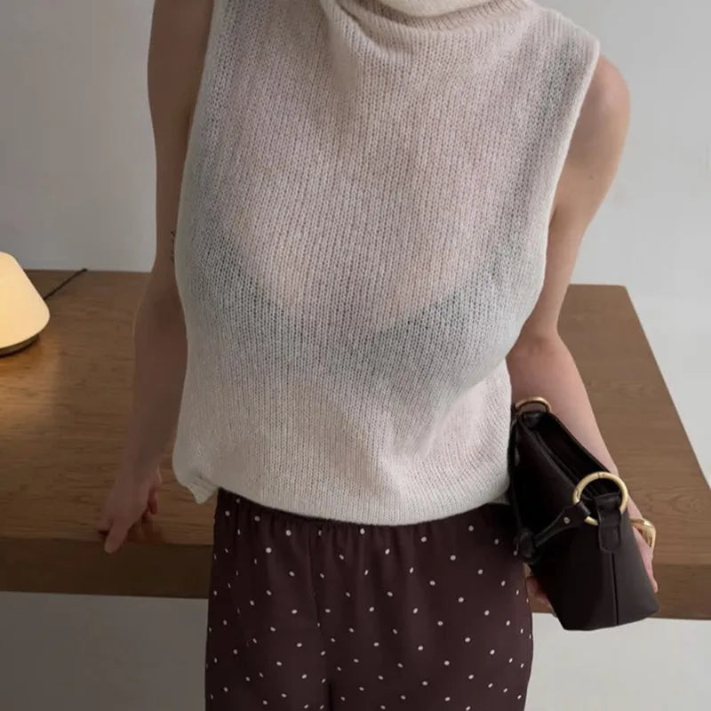 Transparent oversized striktrøje med udskæringer
