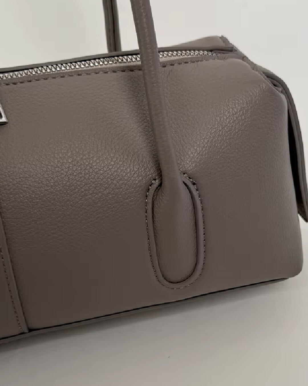 Mira Cylinder Shoulder Bag in taupe grey – styled look